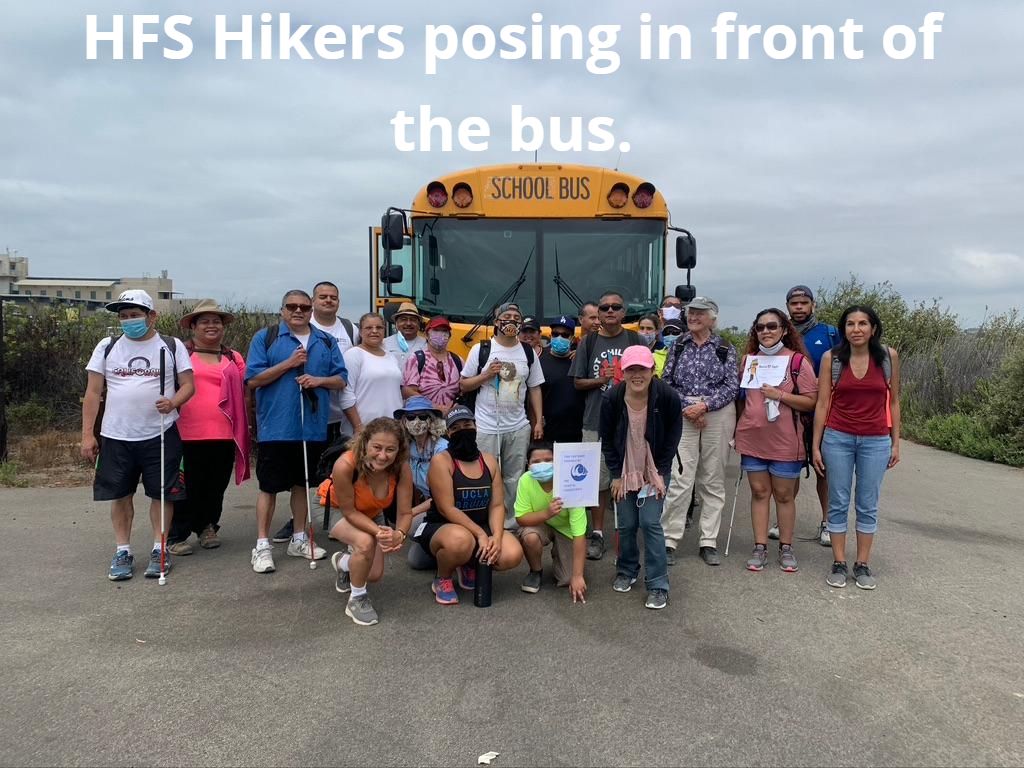 Group in front of bus